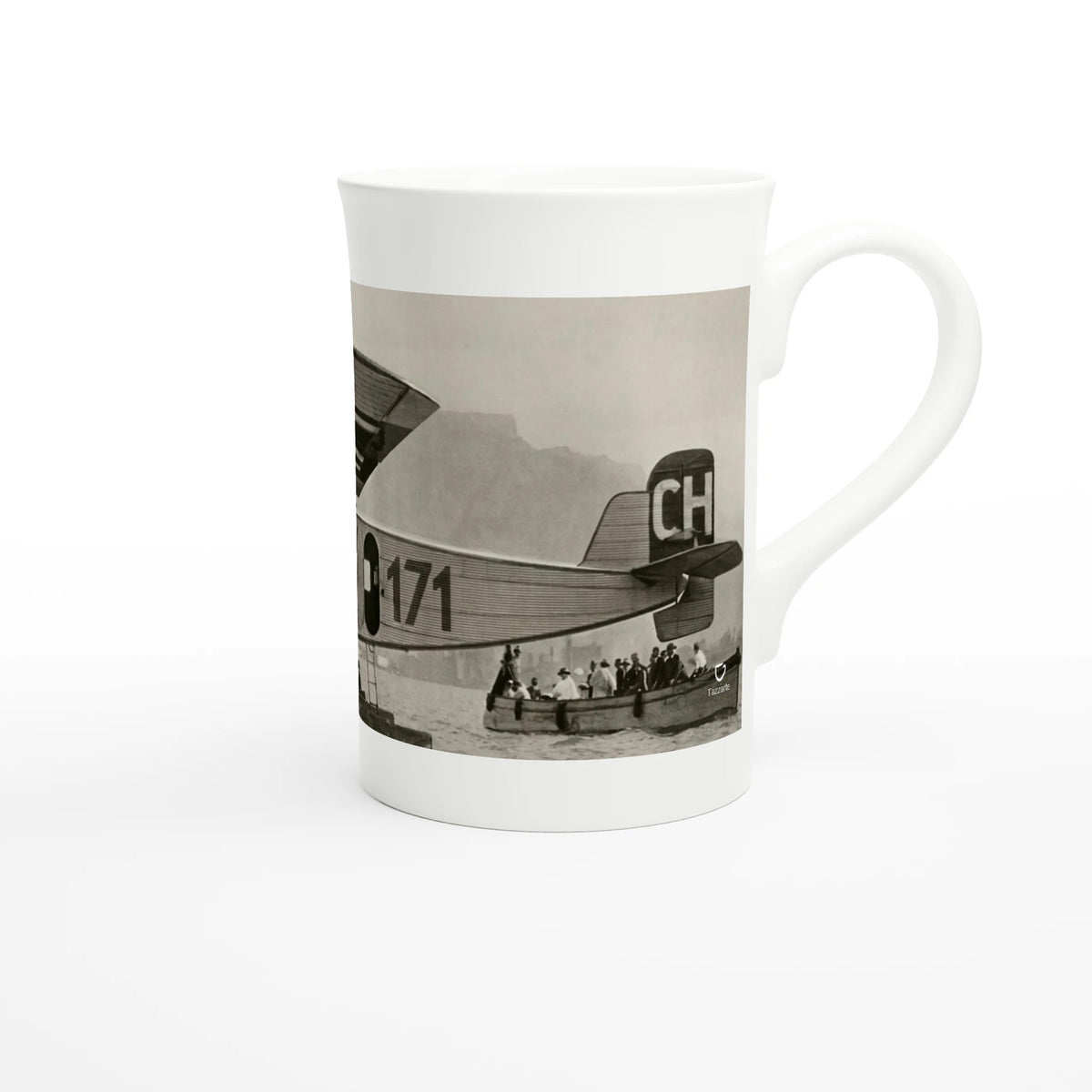 Porcelain mug seen from the right, handle on the right, showing the tail with the marking CH