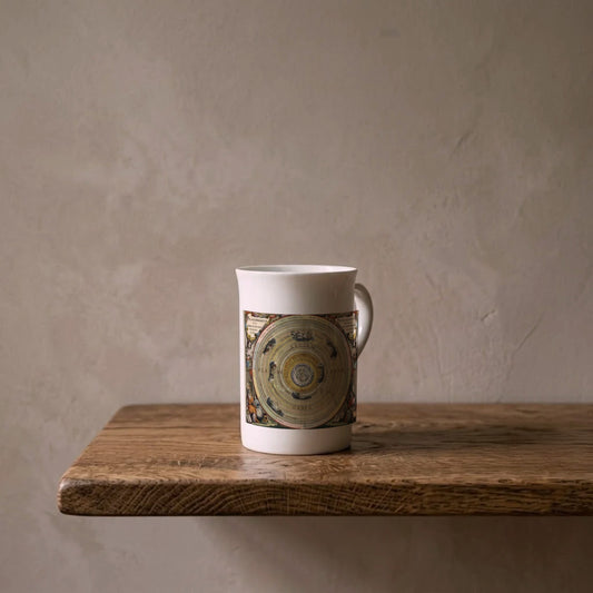 Andreas Cellarius: Planisphaerium Ptolemaicum, 1661 – porcelain art mug on an oiled oak shelf against a limewashed wall