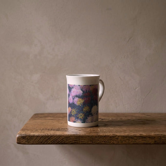 Bed of Chrysanthemums – porcelain art mug on an oiled oak shelf against a limewashed wall