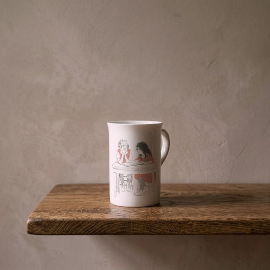 Heidi and Her Friend – porcelain art mug on an oiled oak shelf against a limewashed wall