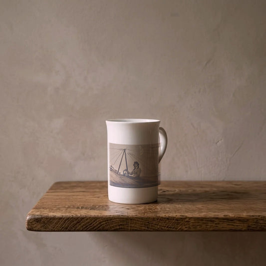 Melli Beese, Germany's First Aviatress, 1911 – porcelain art mug on an oiled oak shelf against a limewashed wall
