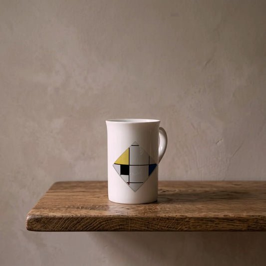 Piet Mondrian: Lozenge Composition, 1921 – porcelain art mug on an oiled oak shelf against a limewashed wall