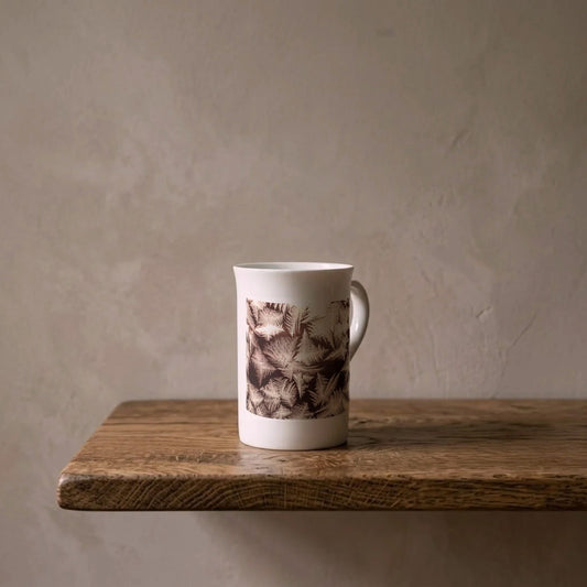 Wilson Bentley: Frost, c. 1910 – porcelain art mug on an oiled oak shelf against a limewashed wall