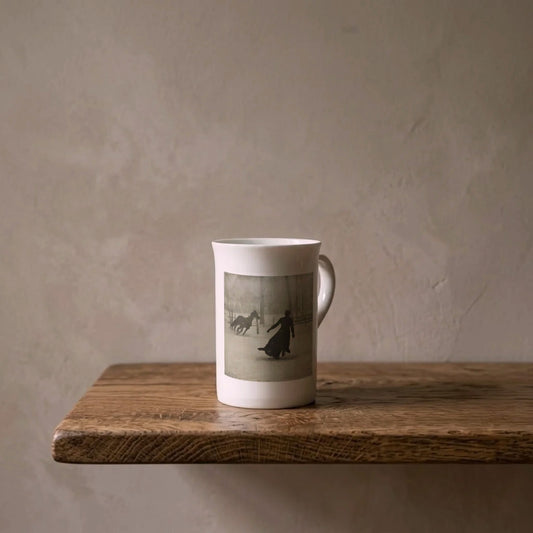 Attributed to Félix Thiollier: Lady and Horse in the Snow, 1899 – porcelain art mug on an oiled oak shelf against a limewashed wall