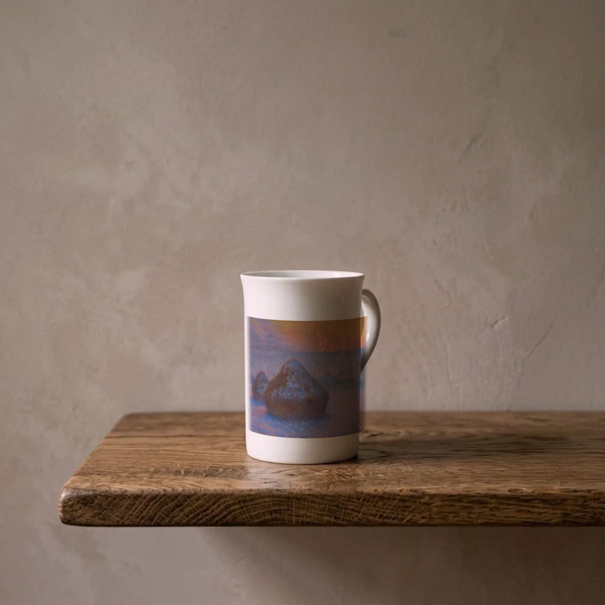 Claude Monet: Stacks of Wheat, 1890–91 – porcelain art mug on an oiled oak shelf against a limewashed wall