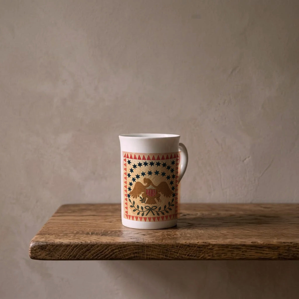 Eagle Quilt: Twenty-Six Stars, 1837 – porcelain art mug on an oiled oak shelf against a limewashed wall