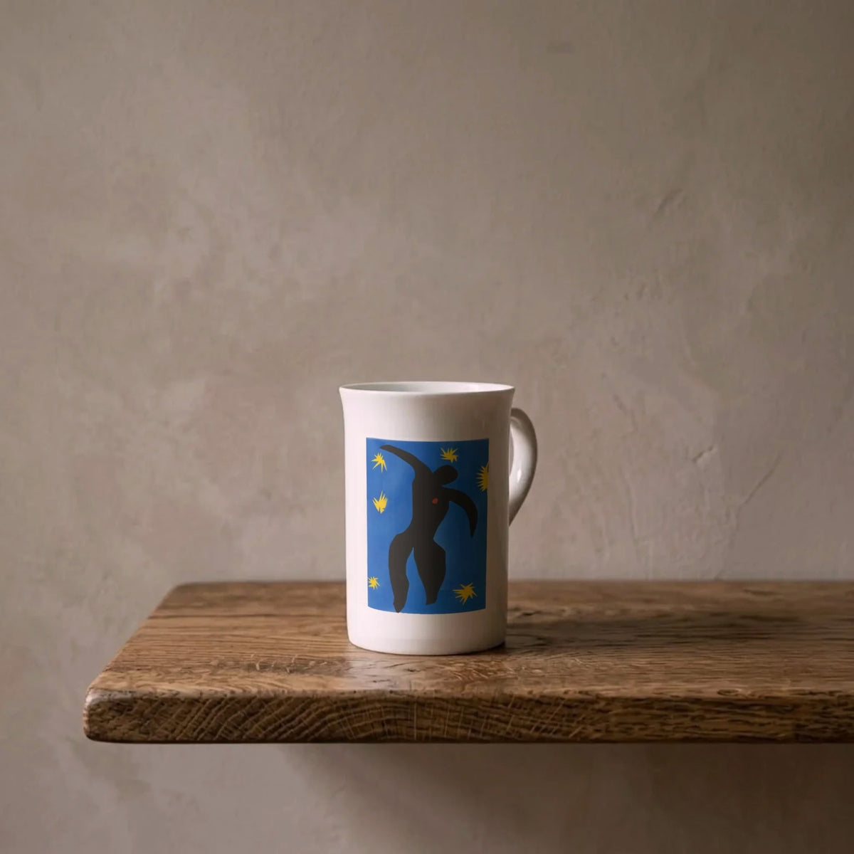 Henri Matisse: Icarus, 1947 – porcelain art mug on an oiled oak shelf against a limewashed wall