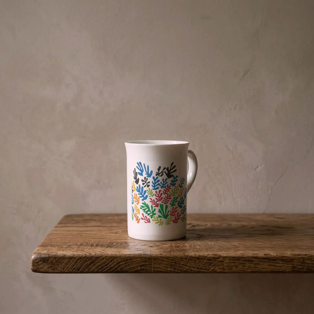 Henri Matisse: La Gerbe, 1953 – porcelain art mug on an oiled oak shelf against a limewashed wall