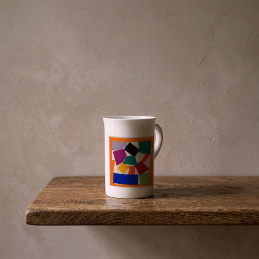 Henri Matisse: The Snail, 1953 – porcelain art mug on an oiled oak shelf against a limewashed wall