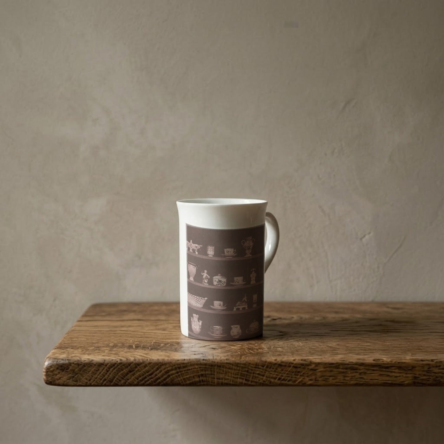 William Henry Fox Talbot: Articles of China (Detail), 1844 – porcelain art mug on an oiled oak shelf against a limewashed wall