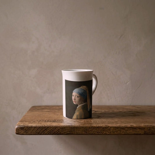 Johannes Vermeer: Girl with a Pearl Earring, c. 1665 – porcelain art mug on an oiled oak shelf against a limewashed wall