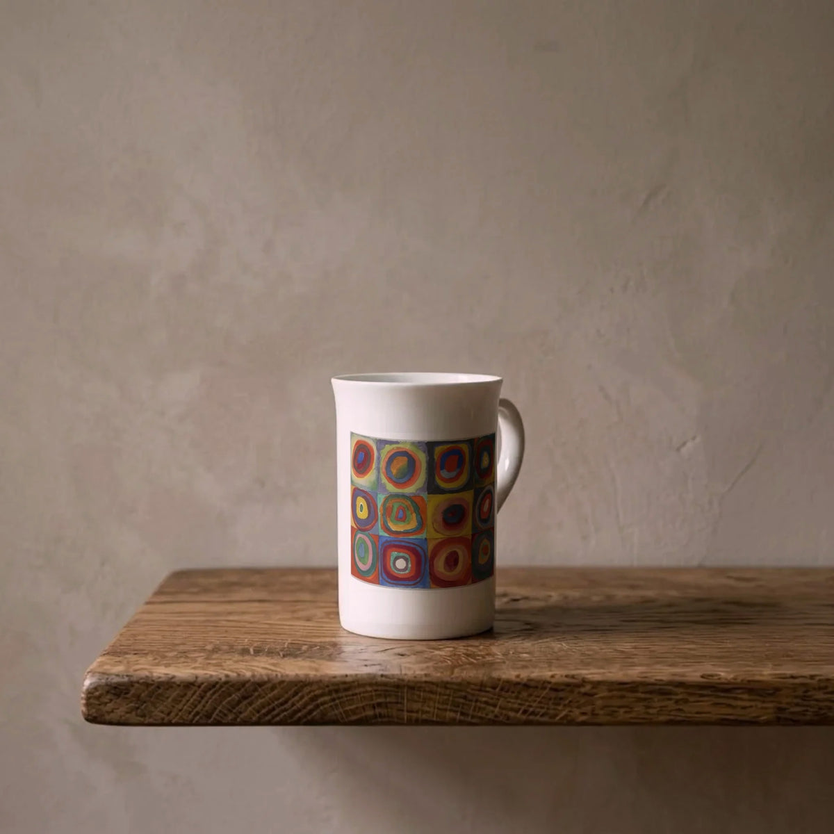 Wassily Kandinsky: Concentric Rings, 1913 – porcelain art mug on an oiled oak shelf against a limewashed wall