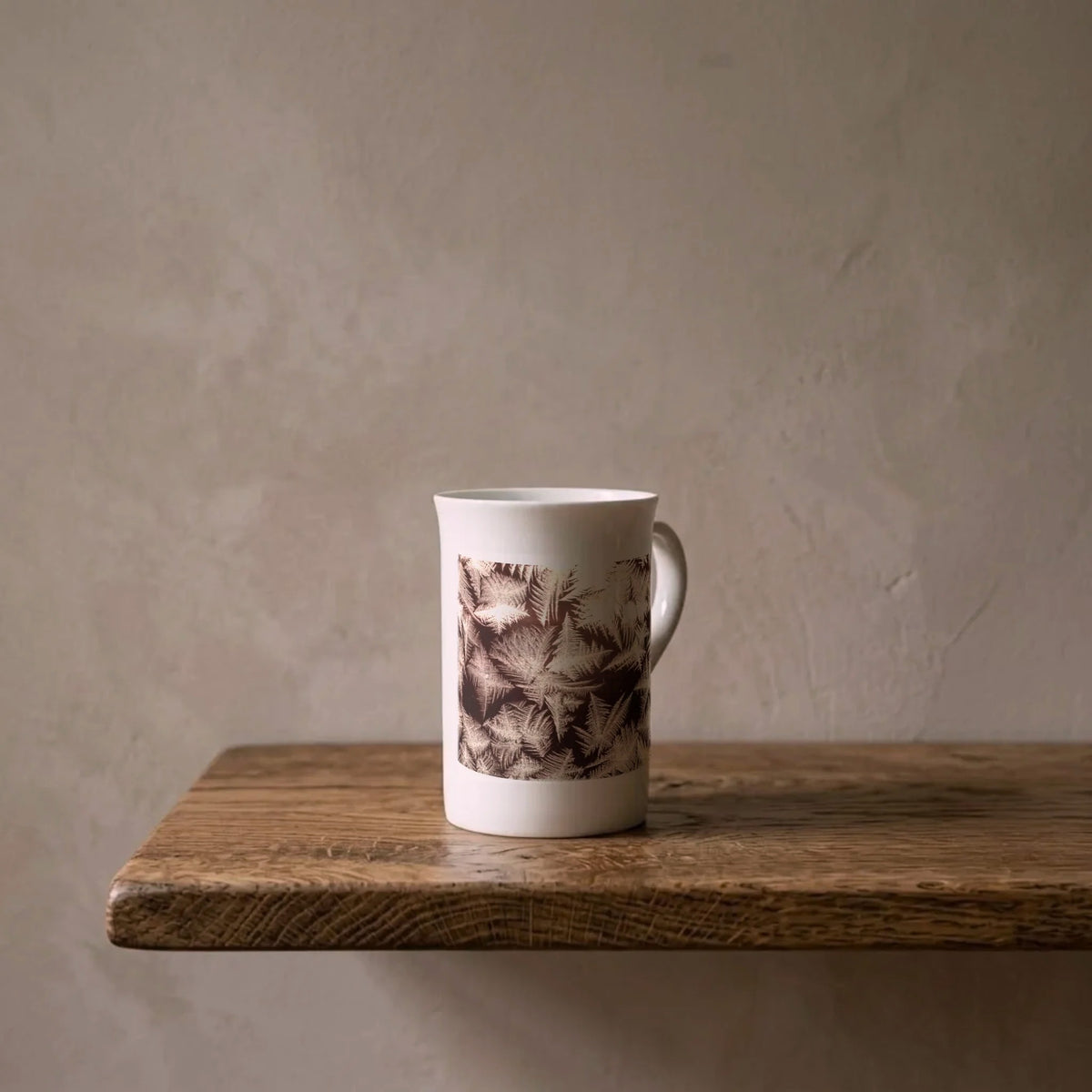 Wilson Bentley: Frost, c. 1910 – porcelain art mug on an oiled oak shelf against a limewashed wall